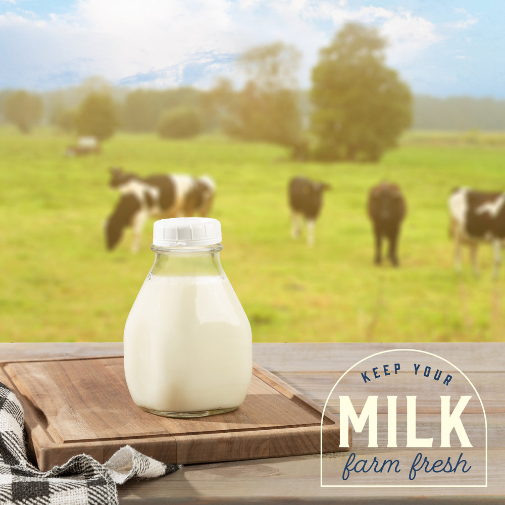 Farmhouse glass milk bottles with lids and pour spouts