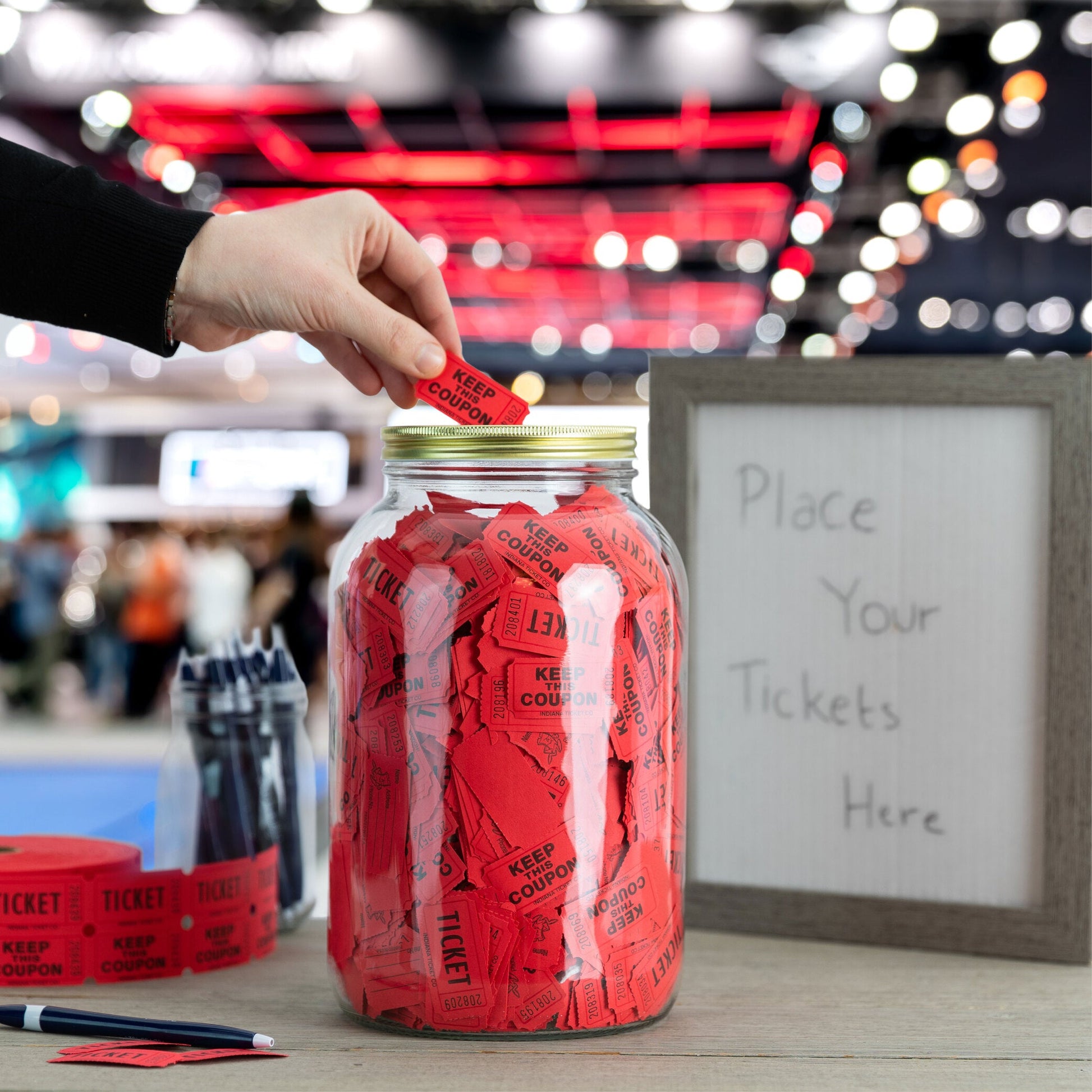 Half gallon coin jar filling with change